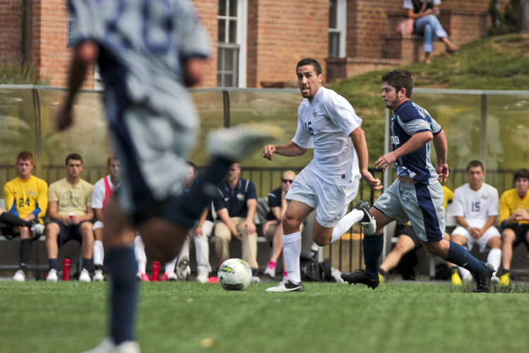 Midfielder Zach Abaie looks for an open man, trying to create a play during a game against Longwood.