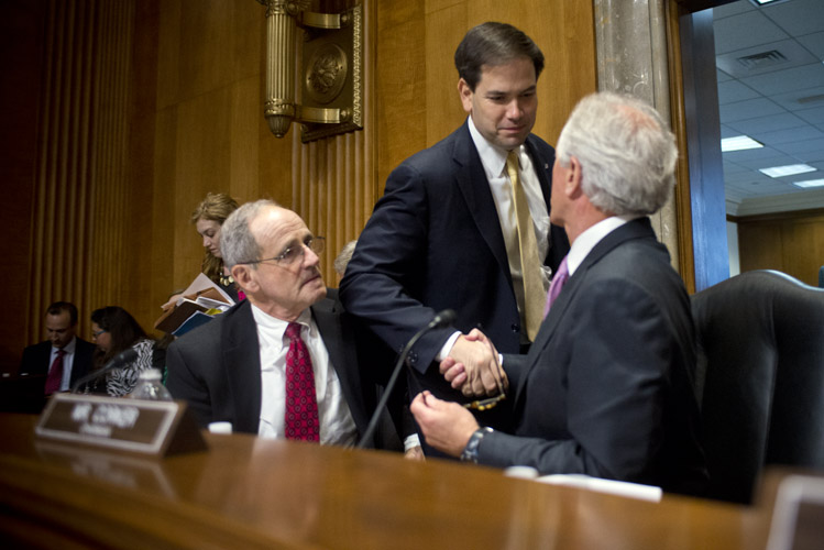 Rubio thanks Chairman Bob Corker following the unanimous vote in support of the legislation Corker negotiated with his Democratic counterparts. Rubio introduced an amendment that would require Iran to recognize the state of Israel, a maneuver that would likely have lost the legislation Democratic votes. Understanding that a bill with unanimous support would be difficult for Obama to veto, Rubio compromised with Corker and accepted the failure of the amendment in return for the chance to have a public vote on it.