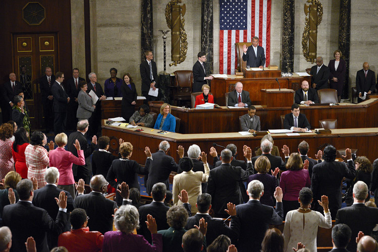 The Speaker leads the House of Representatives in taking the Oath of Office. Boehner spent the next several hours ceremonially swearing in all 247 members individually and meeting with their families. The first day of the session is one of celebration; the partisan battles will come later.