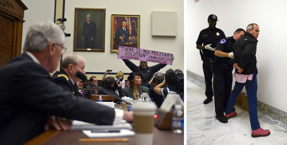 Tighe Barry, of anti-war group Code Pink, interrupts Defense Secretary Chuck Hagel's testimony regarding the conflict against the Islamic State. Barry, who was protesting any further American military intervention in the Middle East, was promptly escorted out of the House Armed Services Committee room and arrested by Capitol police.