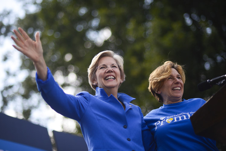 Randi Weingarten, the president of the American Federation of Teachers, introduces Sen. Elizabeth Warren of Massachusetts during an outdoor rally weeks before the 2014 midterm elections. Warren was warmly received by the audience, which included many retirees and union members and considered reliable Democratic constituencies.